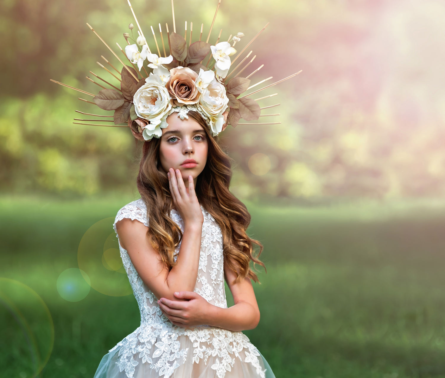 <alt>beautiful young girl in a luxury couture gown wearing a flower headpiece of cream roses and gold spikes</alt>
