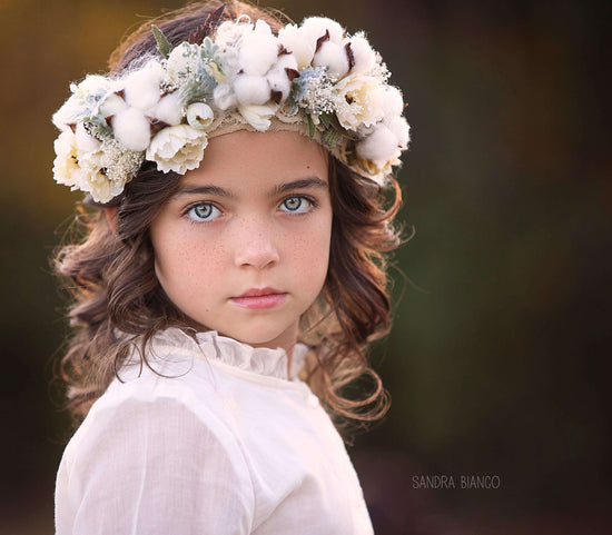 <alt>stunning blue eyed girl wearing natural cotton boho style headpiece by Honeydrops Designs</alt>